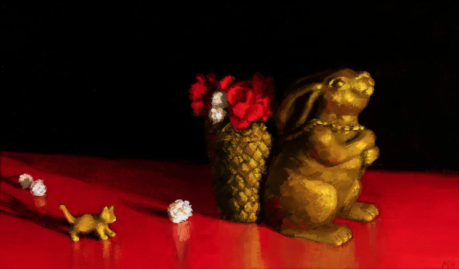 Morning Rounds: a brass rabbit, a basket of red carnations and a tiny gold cat on a glossy red table
